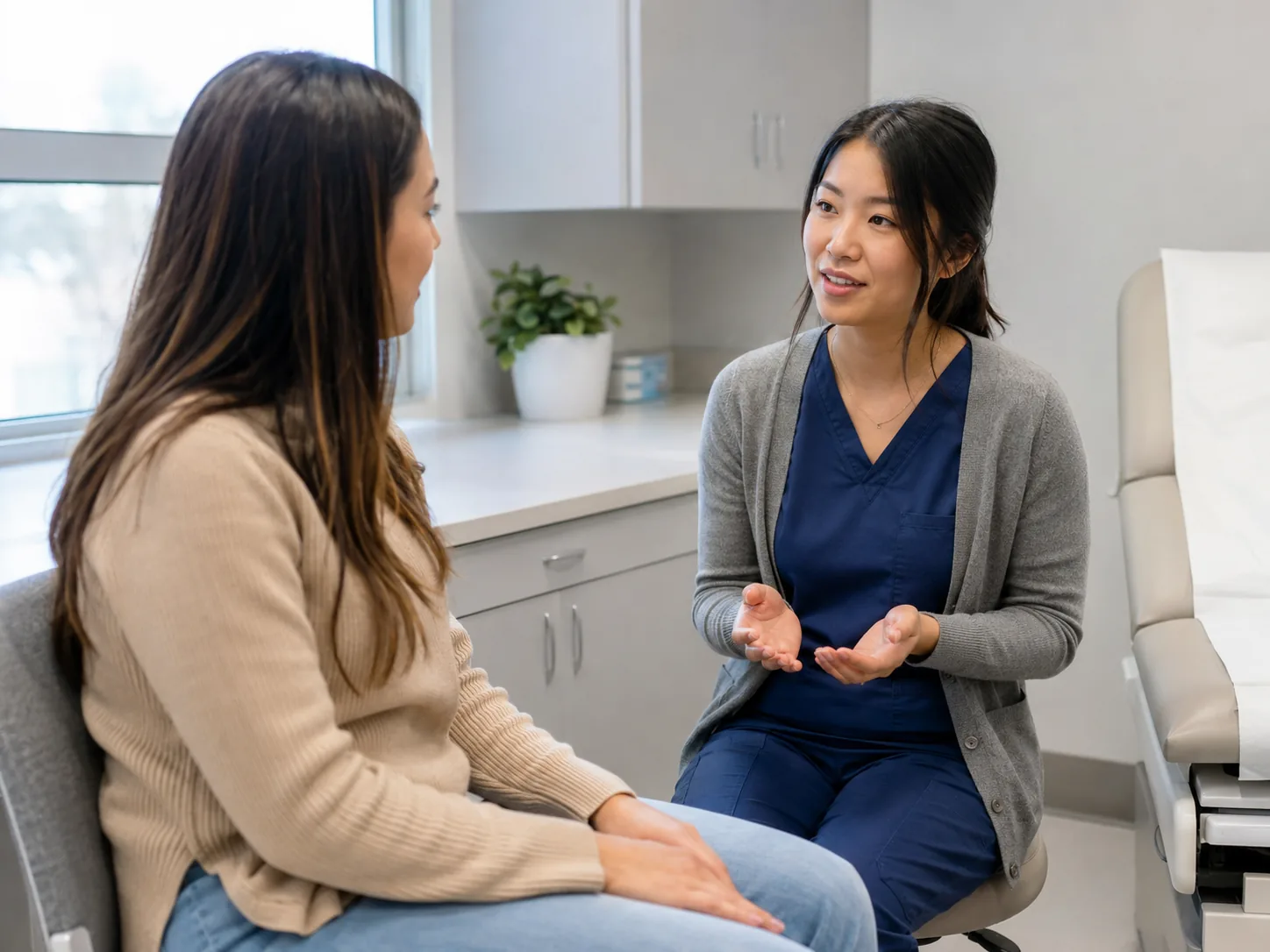 A provider in a women's health consultation with a patient